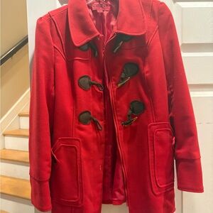 Chic Vibrant Red Trench Coat with Black Toggles